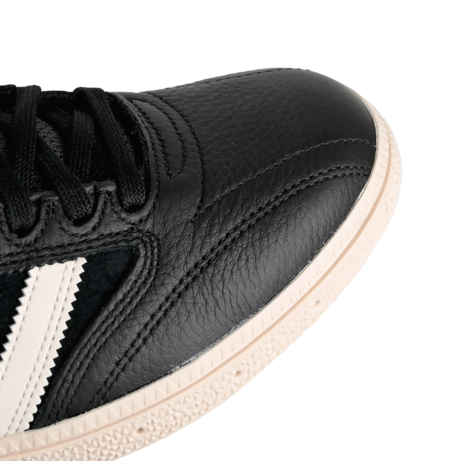 Toe box of Core black cloud white Adidas Skateboarding Dennis Busenitz pro model men's skateboard sneaker on a white background