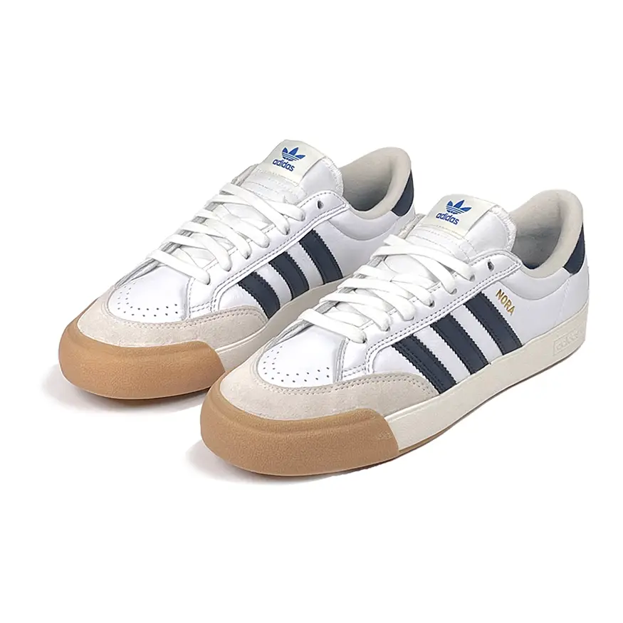 White and navy adidas top shoes