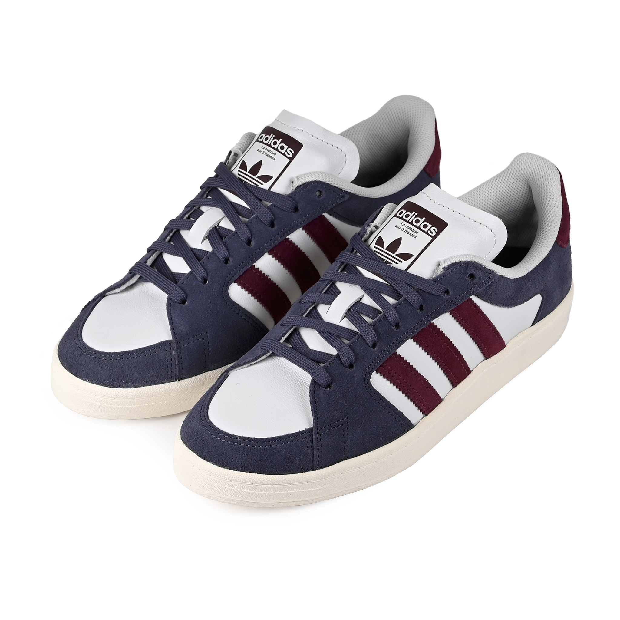 A pair of Shadow Navy adidas Skateboarding Superskate Low skateboard sneakers with maroon stripes on a white background