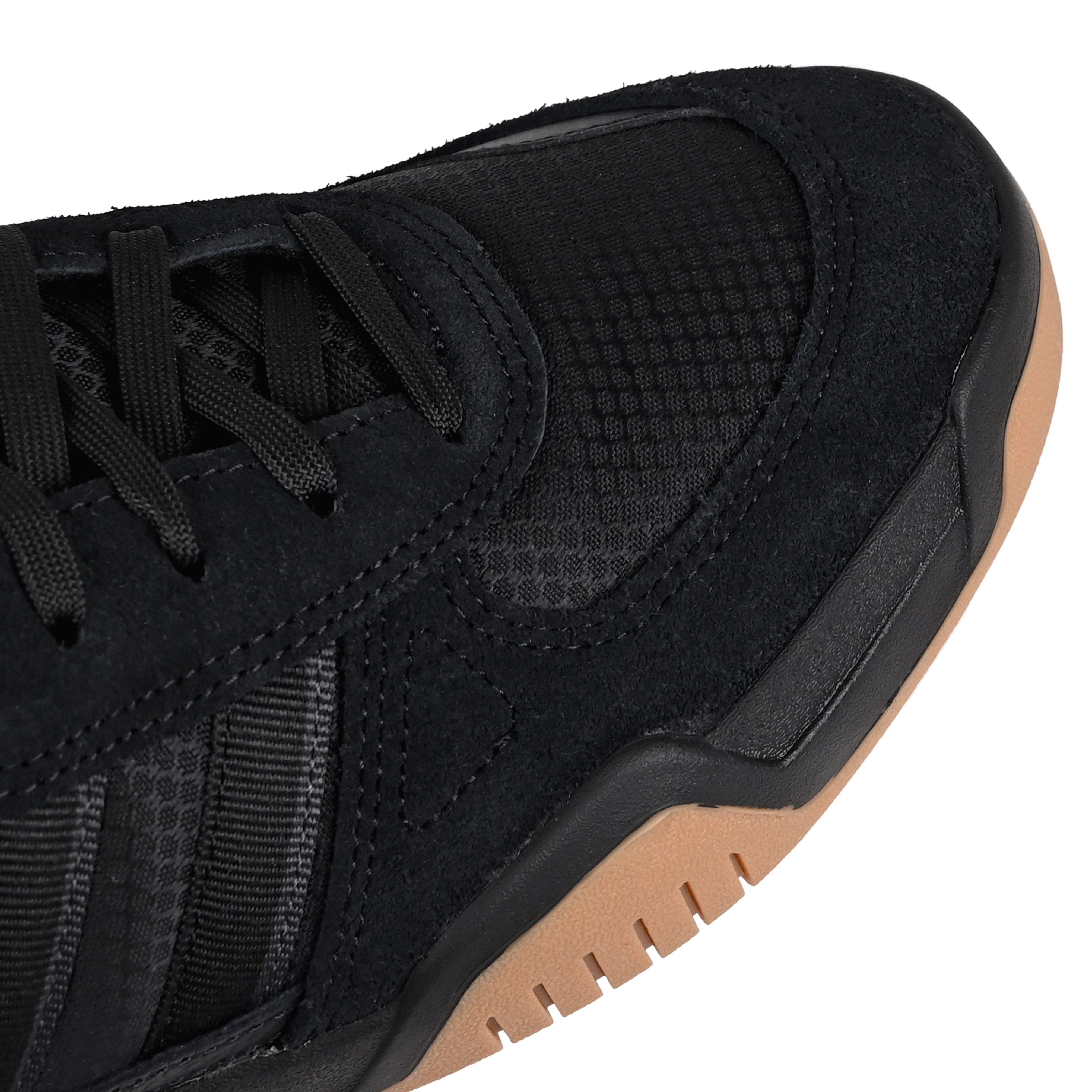 Toe box of core black adidas Skateboarding Tekkira Cup skateboard sneaker on a white background