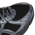 Toe box of Black Asics GT-2160 Sportstyle sneaker with carbon grey 'onitsuka' branding on a white background