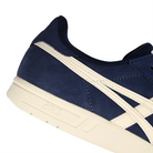 Close up of Midnight navy ASICS GEL-Vickka Pro skateboard sneaker with 'Onitsuka' branding on a white background