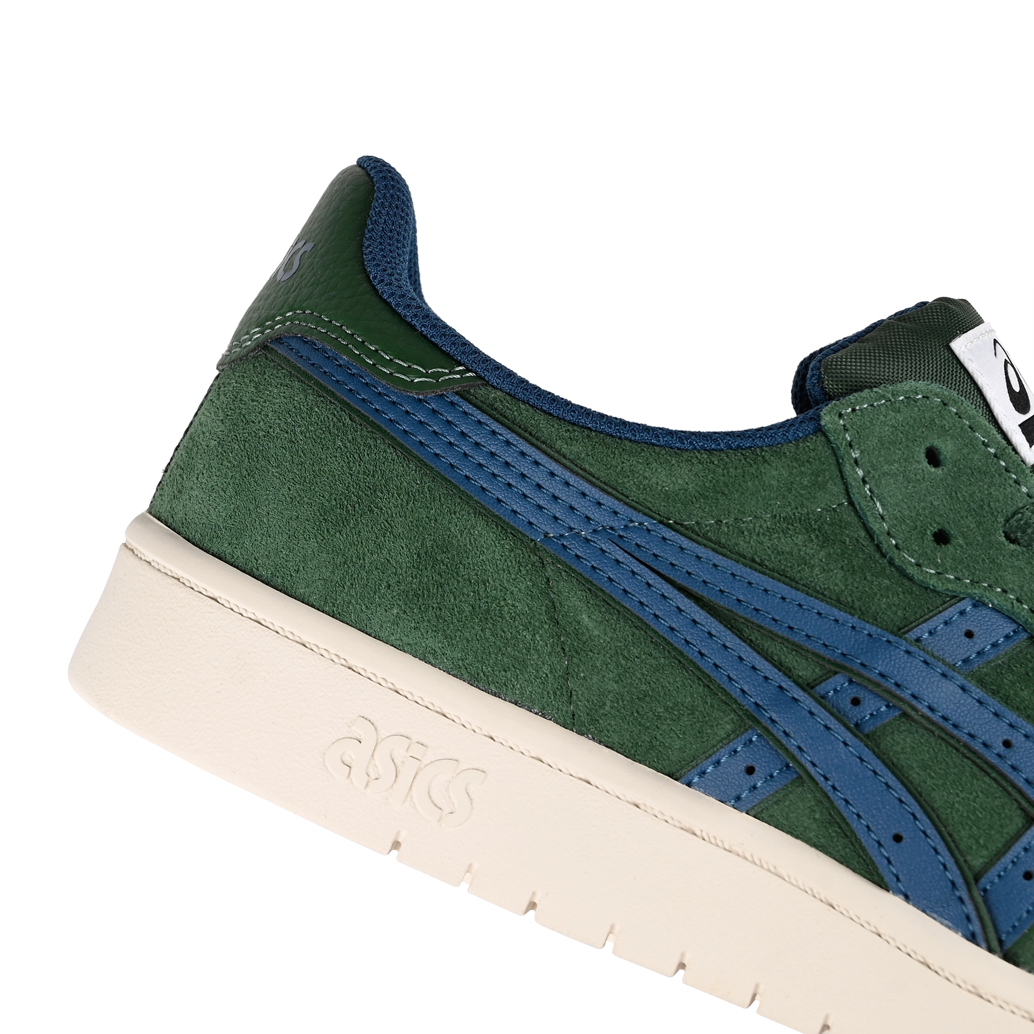 Detail of Forest night Asics Skateboarding Japan Pro skateboard sneaker with Mako Blue Onitsuka branding on a white background