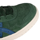 Toe box of Forest night Asics Skateboarding Japan Pro skateboard sneaker with Mako Blue Onitsuka branding on a white background