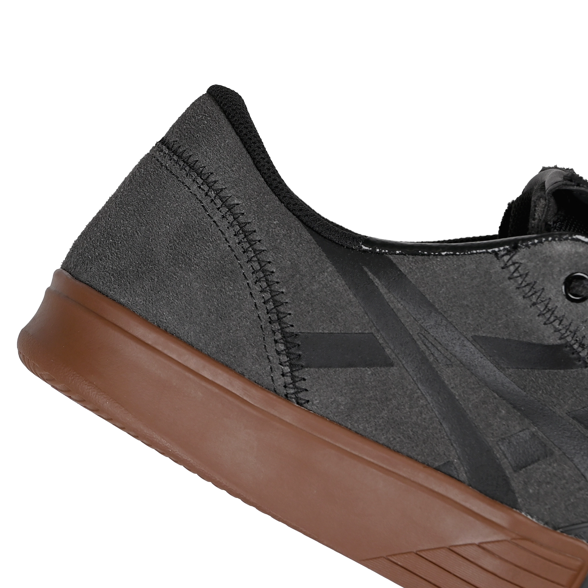 Close up of Graphite grey ASICS Skateboarding x Late Nite Stars GEL-Flexkee Pro 2.0 skateboard sneaker with black 'Onitsuka' branding on a white background
