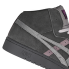 Close up of Graphite grey and clay grey ASICS Japan Mid Pro skateboard sneaker with 'Onitsuka' branding on a white backgorund
