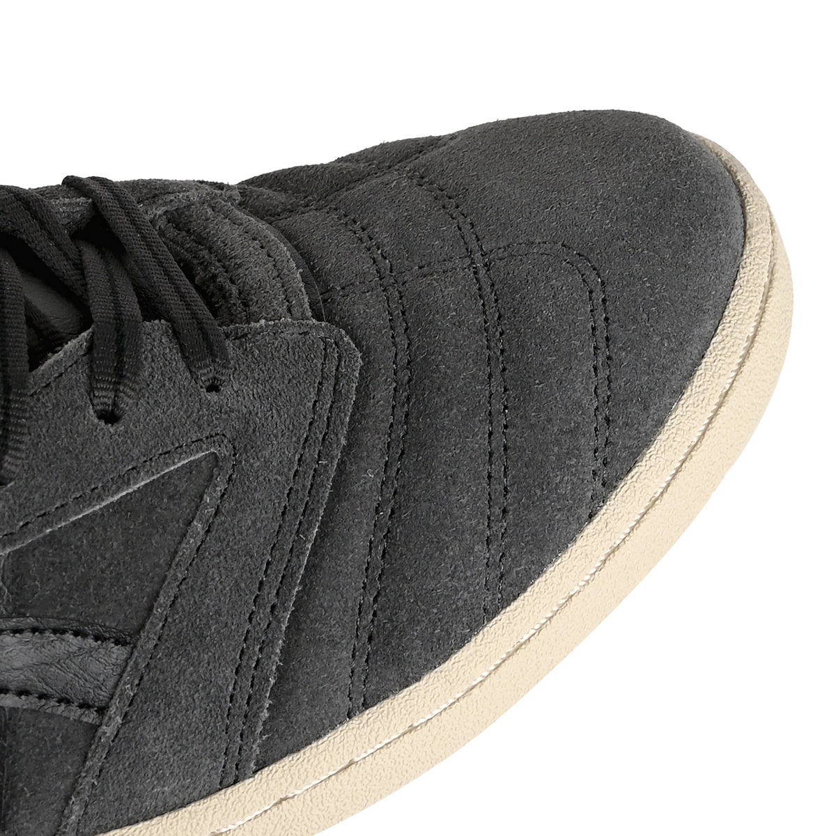 Toe box of Graphite Grey Asics Skateboarding Leggerezza FB men's skateboard sneaker with Onitsuka branding on a white background