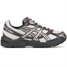 Oatmeal and obsidian grey Asics Sportstyle GEL-1130 men's lifestyle sneaker with 'Onitsuka' branding on a white background