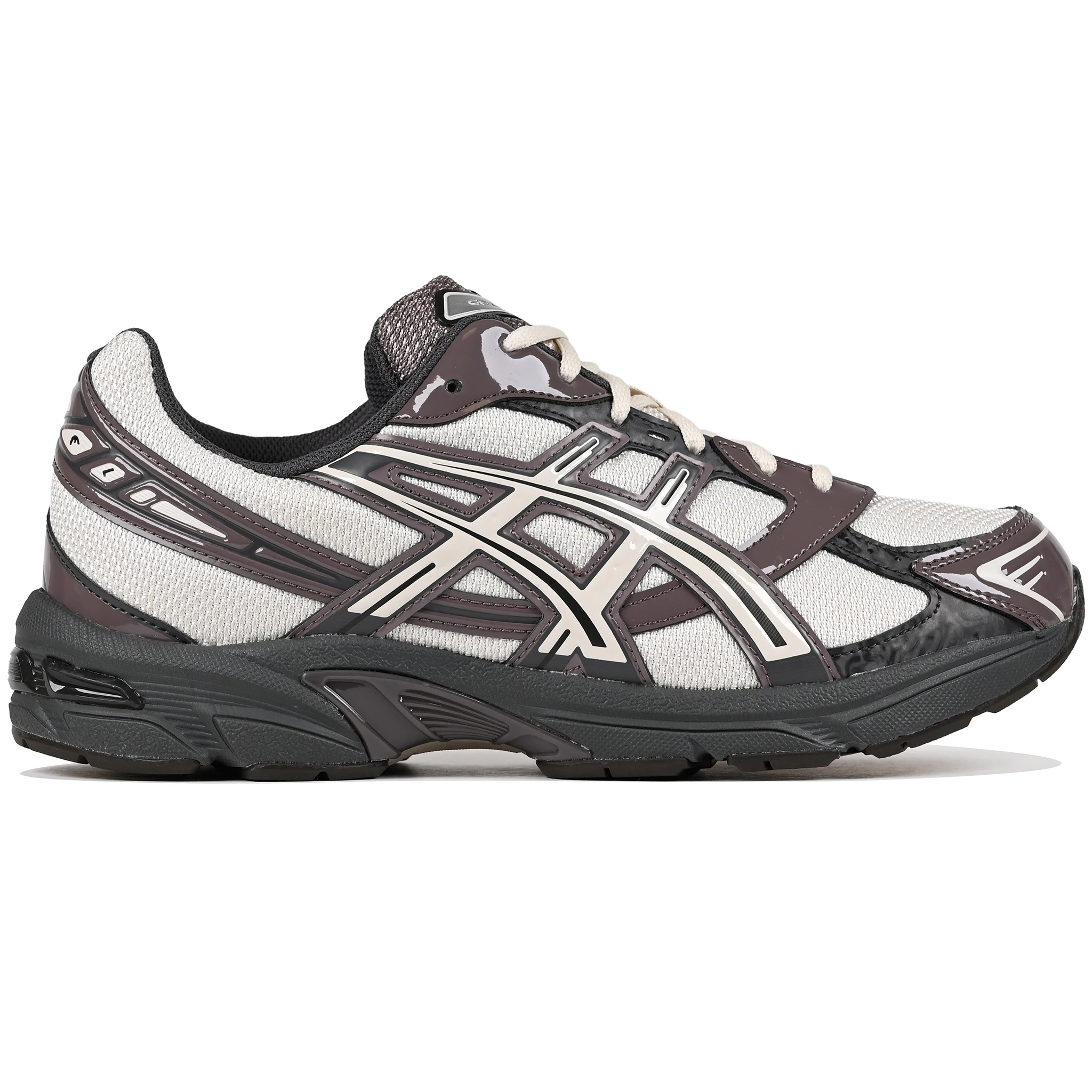 Oatmeal and obsidian grey Asics Sportstyle GEL-1130 men's lifestyle sneaker with 'Onitsuka' branding on a white background