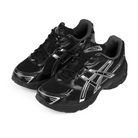 A pair of Black ASICS Sportstyle GEL-1130 with pure silver sneakers 'Onitsuka' branding on a white background