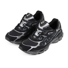 A pair of Graphite grey and black Asics Sportstyle GEL-NYC mens lifestyle sneakers with 'Onitsuka' branding on a white background