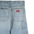 Dickies light blue denim jeans with a Dickies logo on the pocket against a white background