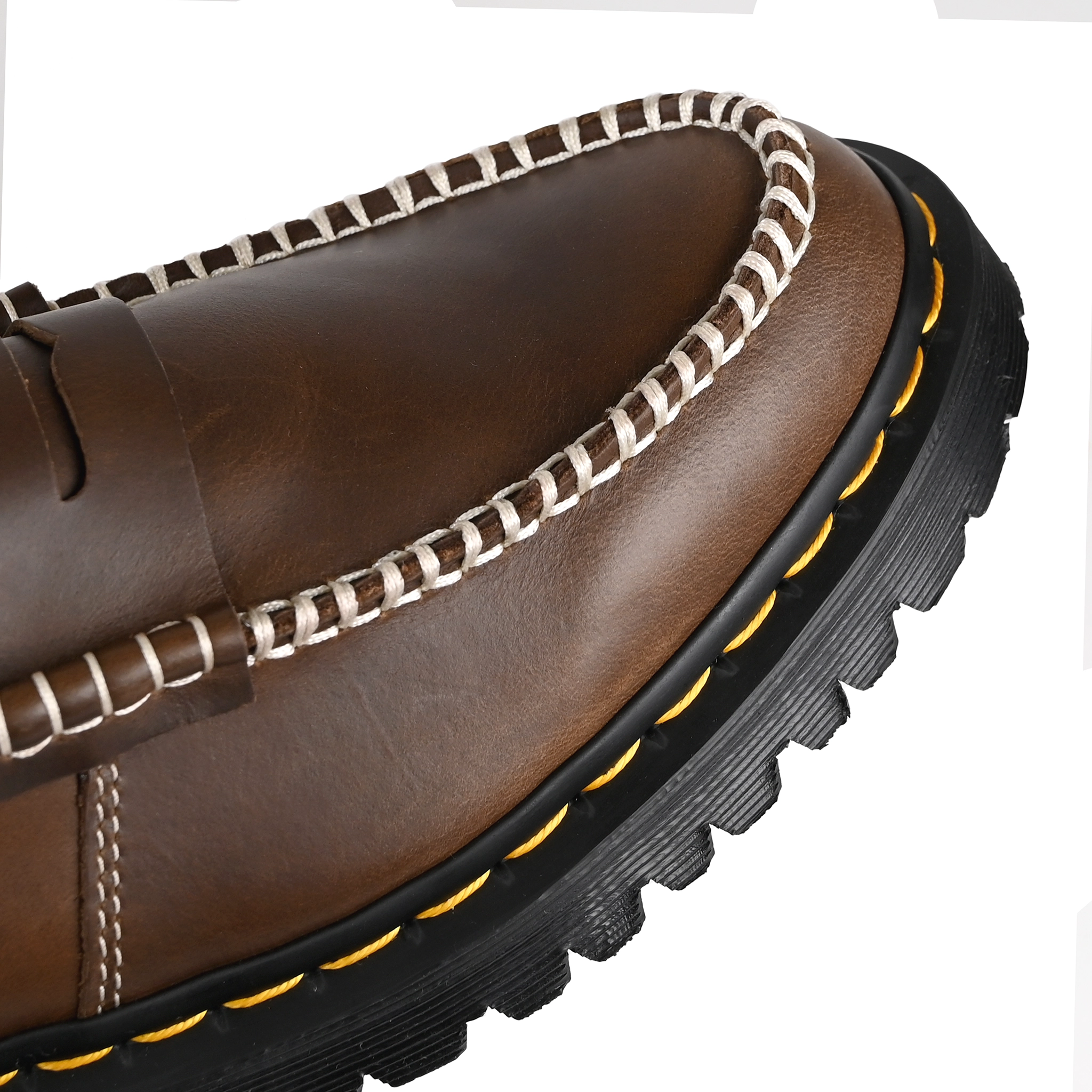 Toe box of Fossil brown Dr. Marten's Penton Ben Mayhem Leather men's loafer on a white background