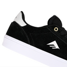 Close up of Emerica Skateboarding MOCA black sneaker with white sole and brand logo on a white background