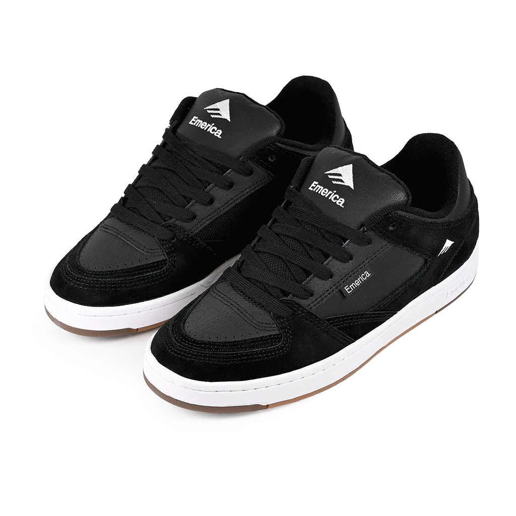 A pair of Black Emerica Skateboarding Mute sneakers with white soles on a white background