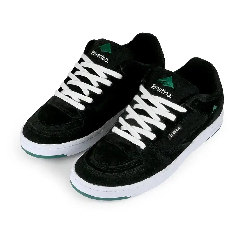 Emerica Mute Skateboarding Shoe in black with white laces, highlighting its retro style and durable design.