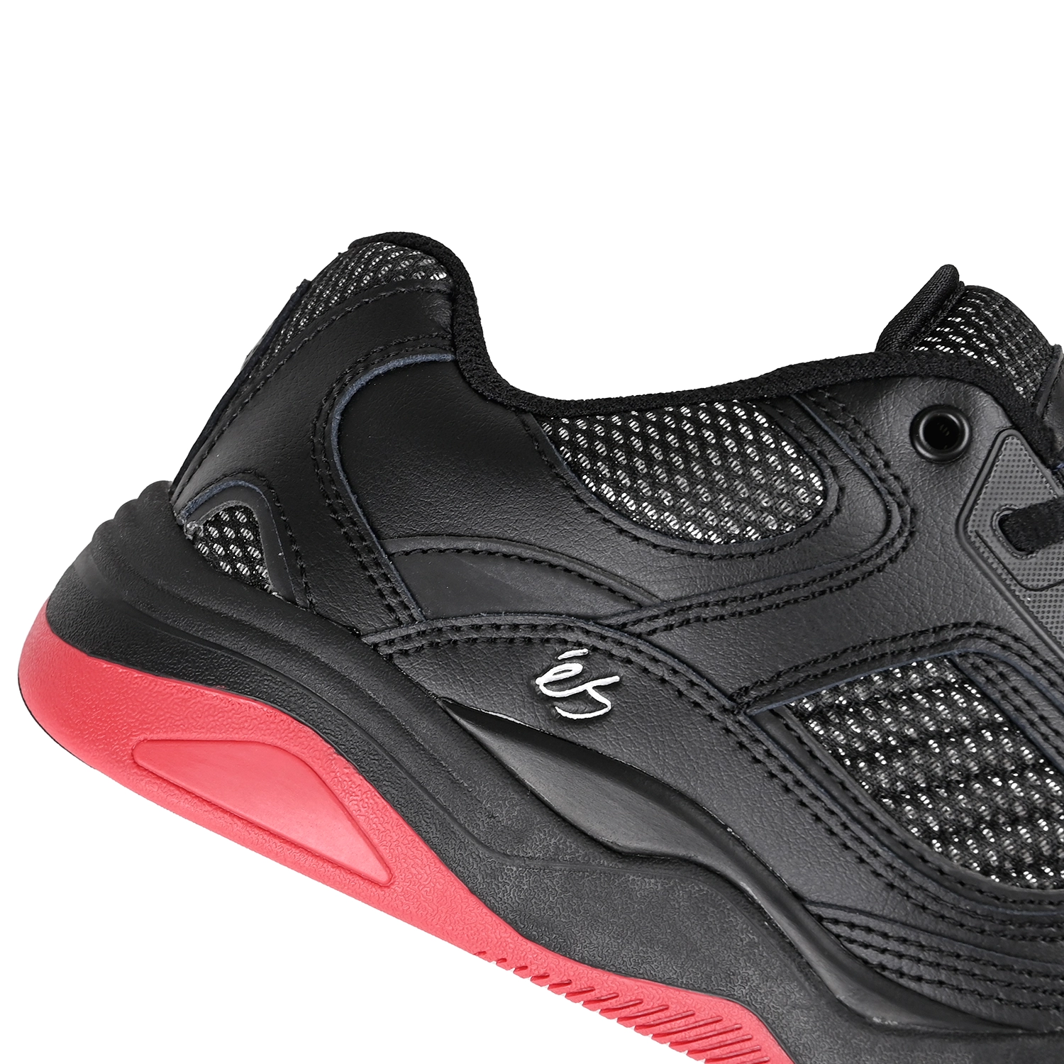 Close up of Black éS Skateboarding TJ Rogers pro model men's skateboard sneaker with red sole on a white background