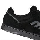 Black Etnies Skateboarding shoe with a brand logo on a white background