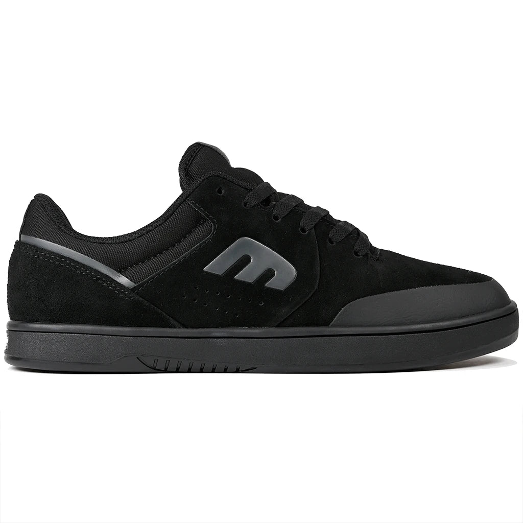Black Etnies Skateboarding sneaker with a brand logo on a white background