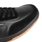 Close up of Black Hours is Yours Bryan Herman pro model skateboard sneaker on a white background