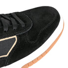 Close up of Black and brown Hours is Yours Jon Dilo pro model skateboard sneaker on a white background