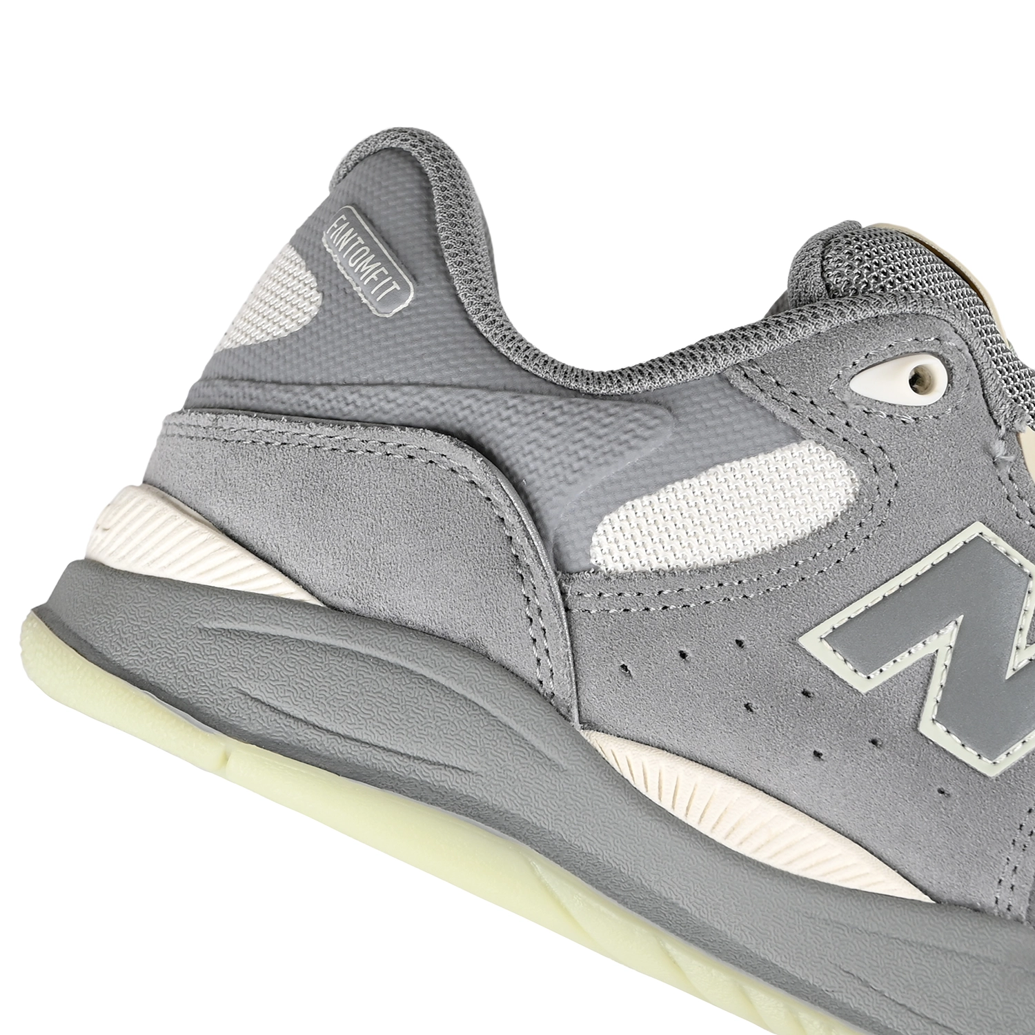 Close up of slate grey and sea salt New Balance Numeric NM1010 Tiago Lemos pro model men's skateboard sneaker on a white background