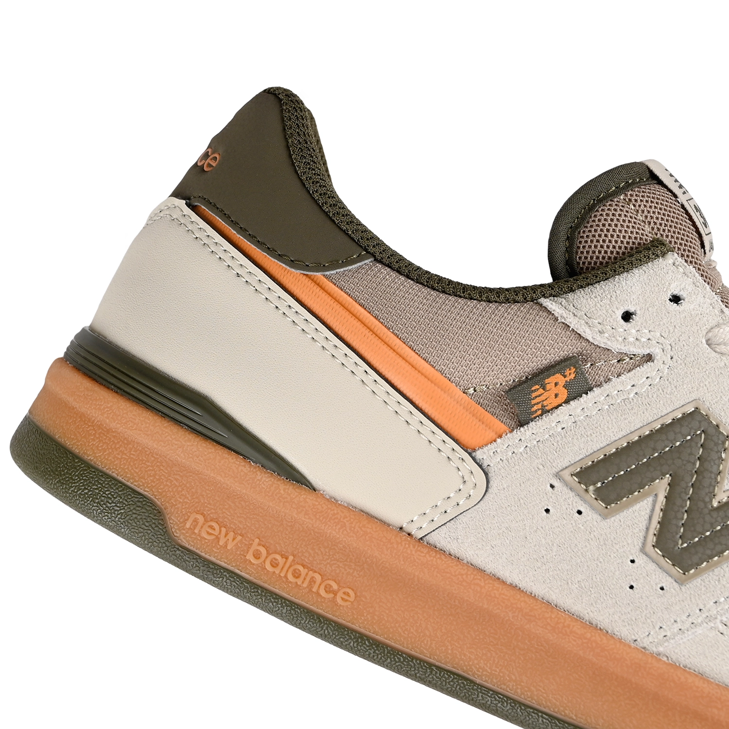 Close up of Timberwolf and dark moss New Balance Numeric NM306 Cup Jamie Foy pro model men's skateboard sneaker on a white background