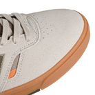 Toe box of Timberwolf and dark moss New Balance Numeric NM306 Cup Jamie Foy pro model men's skateboard sneaker on a white background