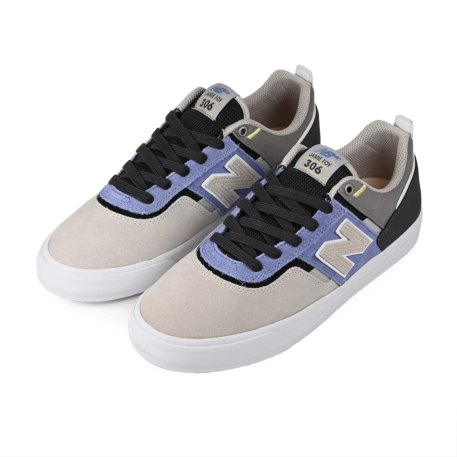 A pair of Fairweather blue and sandstone New Balance Numeric NM306 Jamie Foy pro model men's skateboard sneakers on a white background