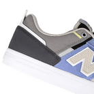 Close up of Fairweather blue and sandstone New Balance Numeric NM306 Jamie Foy pro model men's skateboard sneaker on a white background