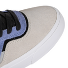 Toe box of Fairweather blue and sandstone New Balance Numeric NM306 Jamie Foy pro model men's skateboard sneaker on a white background