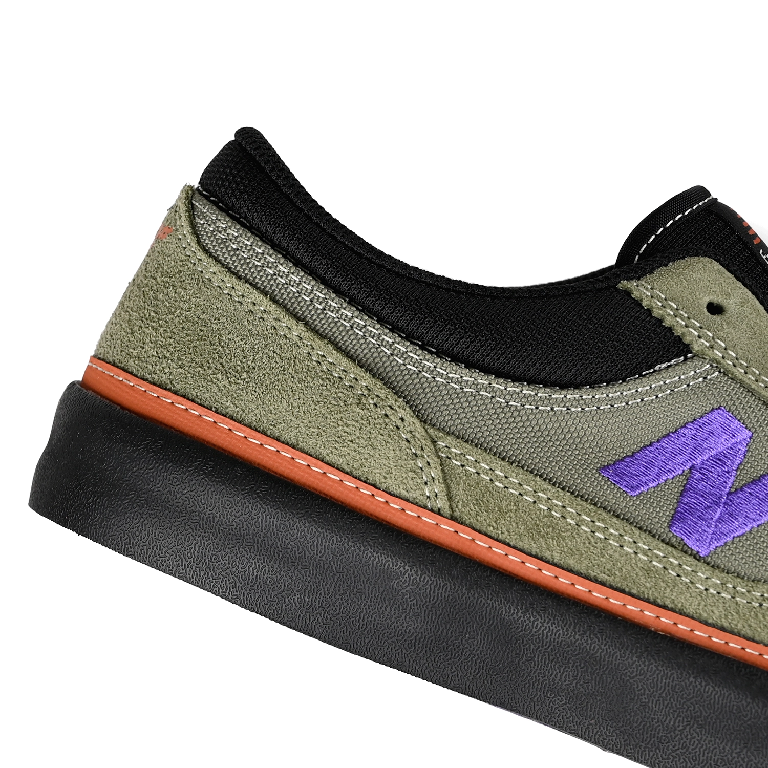 Close up of Dark olivine and electric indigo New Balance Numeric NM417 Franky Villani pro model men's skateboard sneaker on a white background