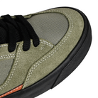 Toe box of Dark olivine and electric indigo New Balance Numeric NM417 Franky Villani pro model men's skateboard sneaker on a white background