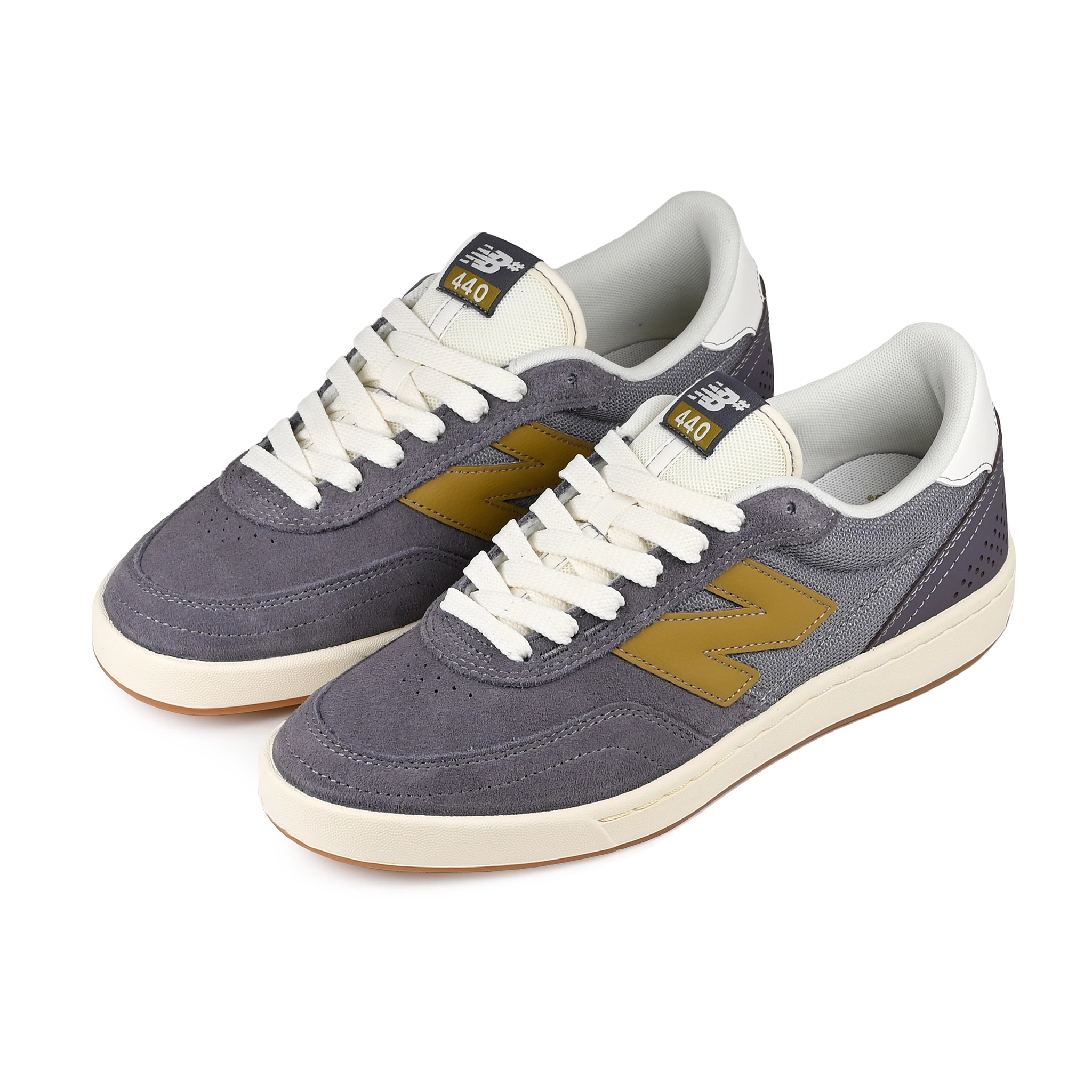 A pair of Neptune Grey New Balance Numeric NM440 skateboarding sneakers with sea moss branding on a white background