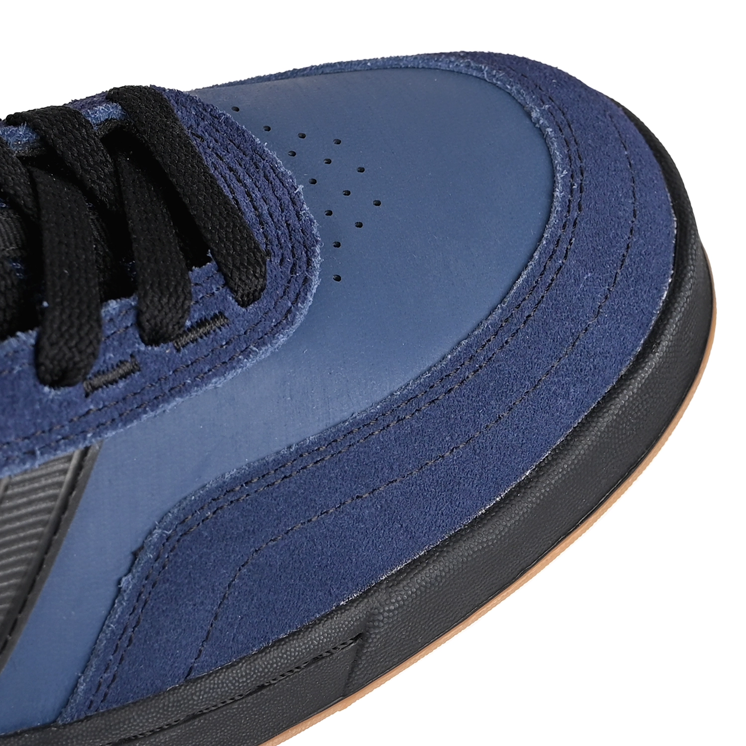 Toe box of Vingtage Indigo and black New Balance Numeric NM440 High top men's skateboarding sneaker on a white background