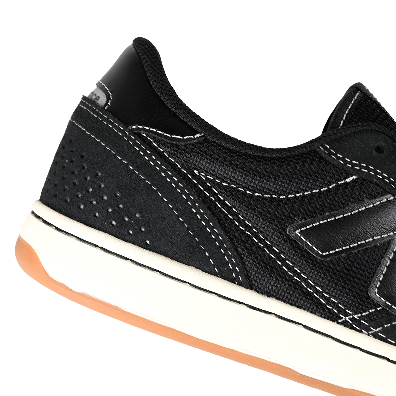 Close up of Black sea salt New Balance Numeric NM440V2 men's skateboard sneaker on a white background