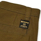 Close up of Olive green No-Comply Skate Chino men's skateboard pant on a white background