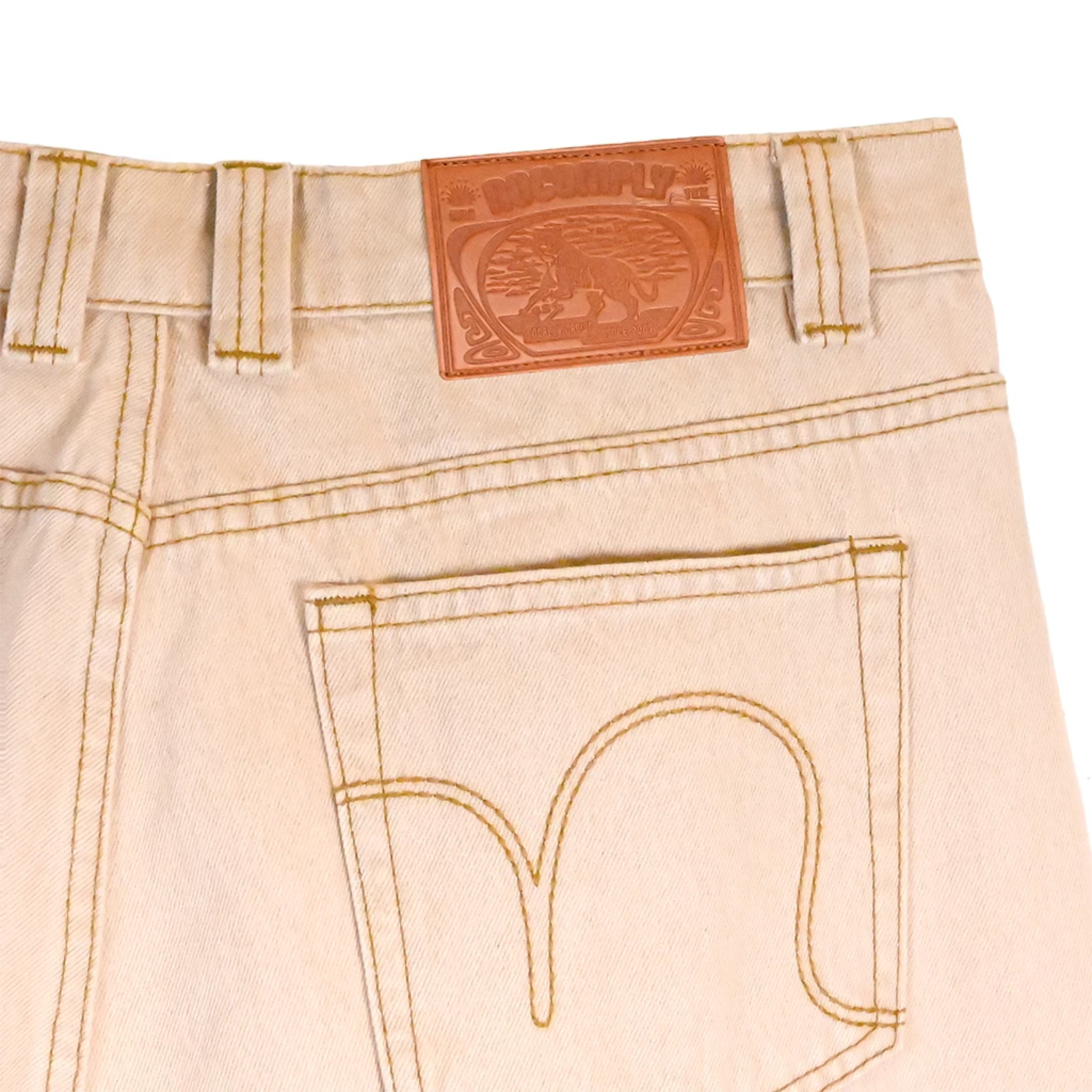 Close up back view of Beige Wash No-Comply Loose Fit denim jeans on a white background