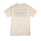 Natural color t-shirt with turquoise No-Comply with screen printed Locally Grown logo on a white background