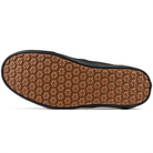 Close-up of Black Vans Made For The Makers slip-on sneaker sole on a white background