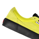 Detail of Fluro Lime Vans Skateboarding Skate Curren Caples pro model skateboard sneaker with a black midsole on a white background