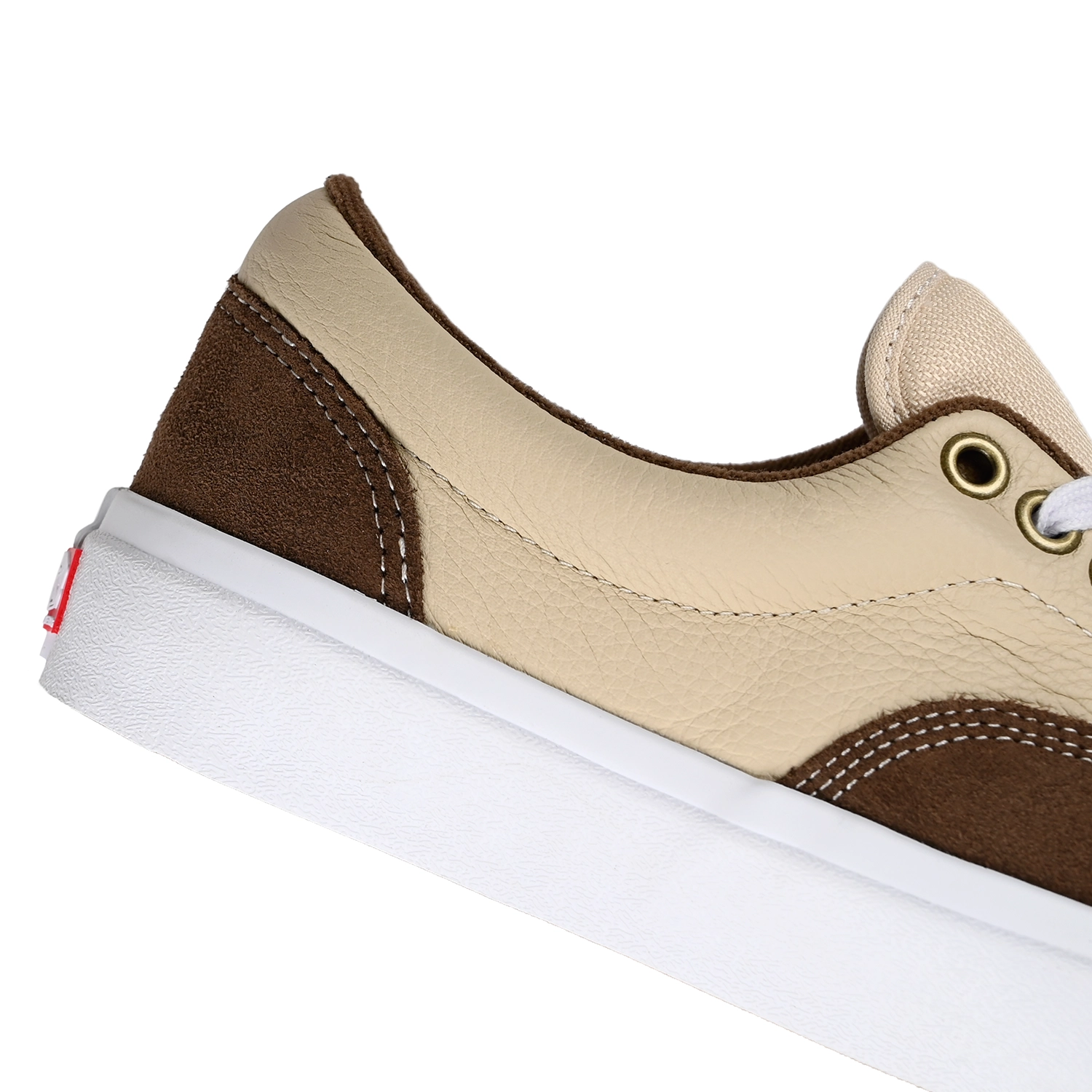 Close up of Brown and tan Vans Skateboarding Skate Era Stub men's skateboard sneaker on a white background