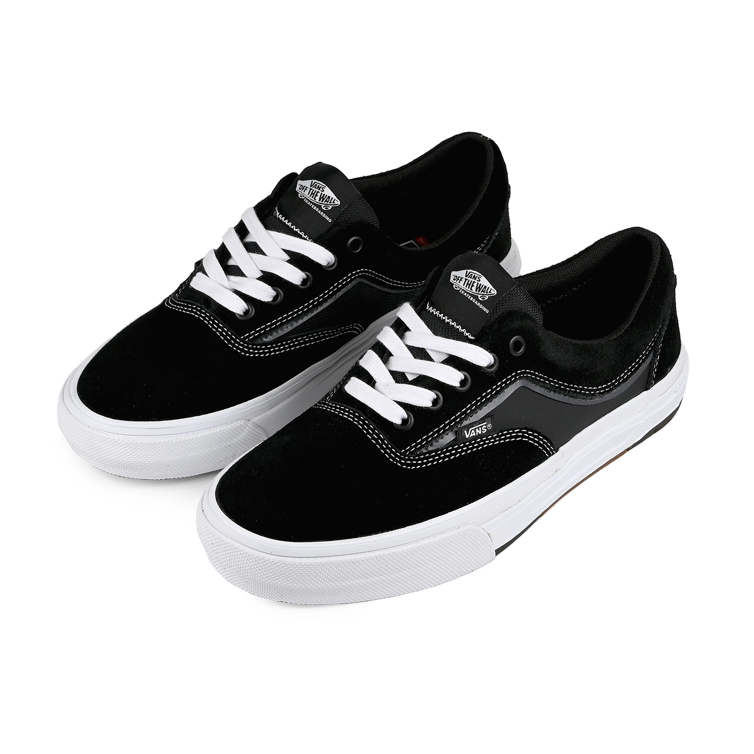 A pair of Vans Era Wafflecup sneakers in black and white with a visible brand logo on a white background