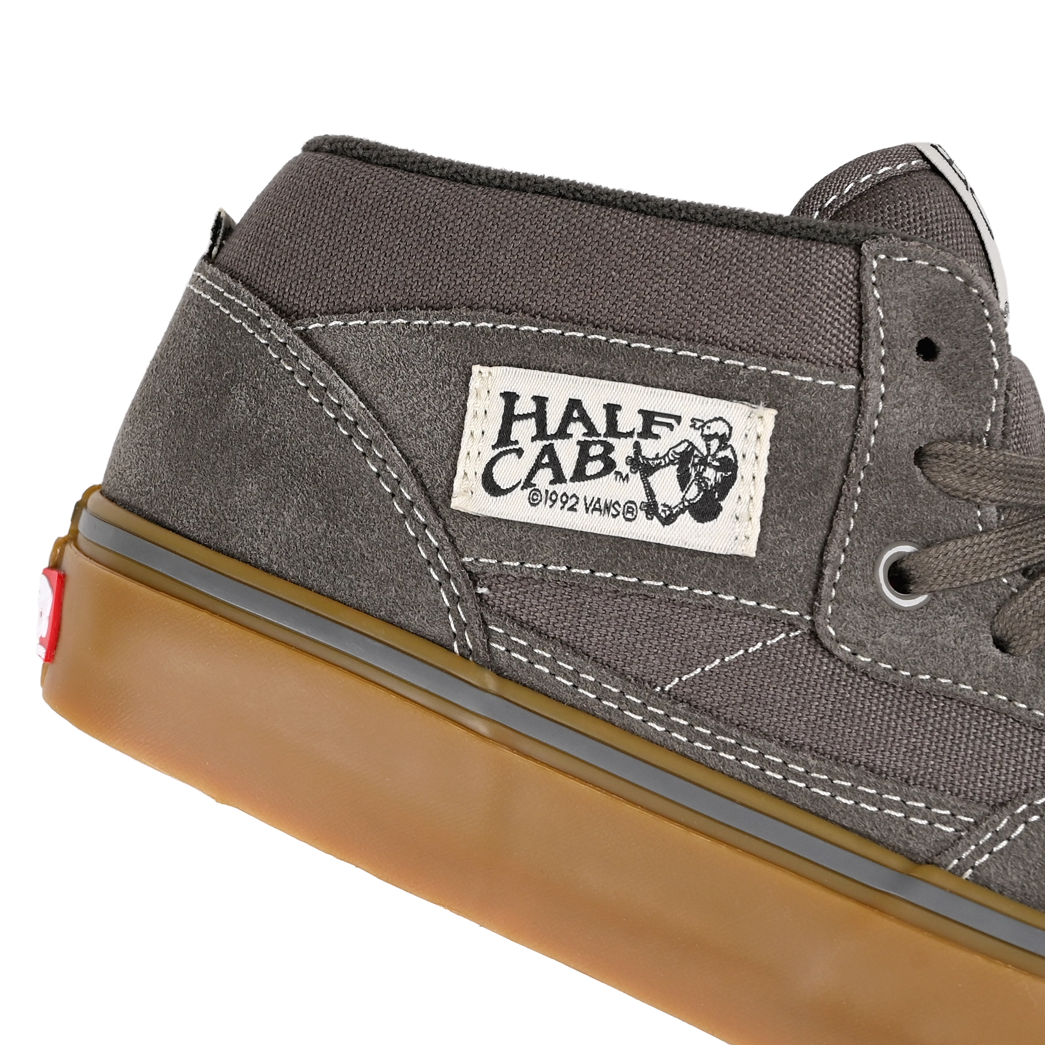 Detail of Walnut Vans Skateboarding Skate Half Cab skateboard sneaker with a gum sole on a white background
