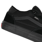 Close up of Vans Rowan sneaker in black with black sole on a white background