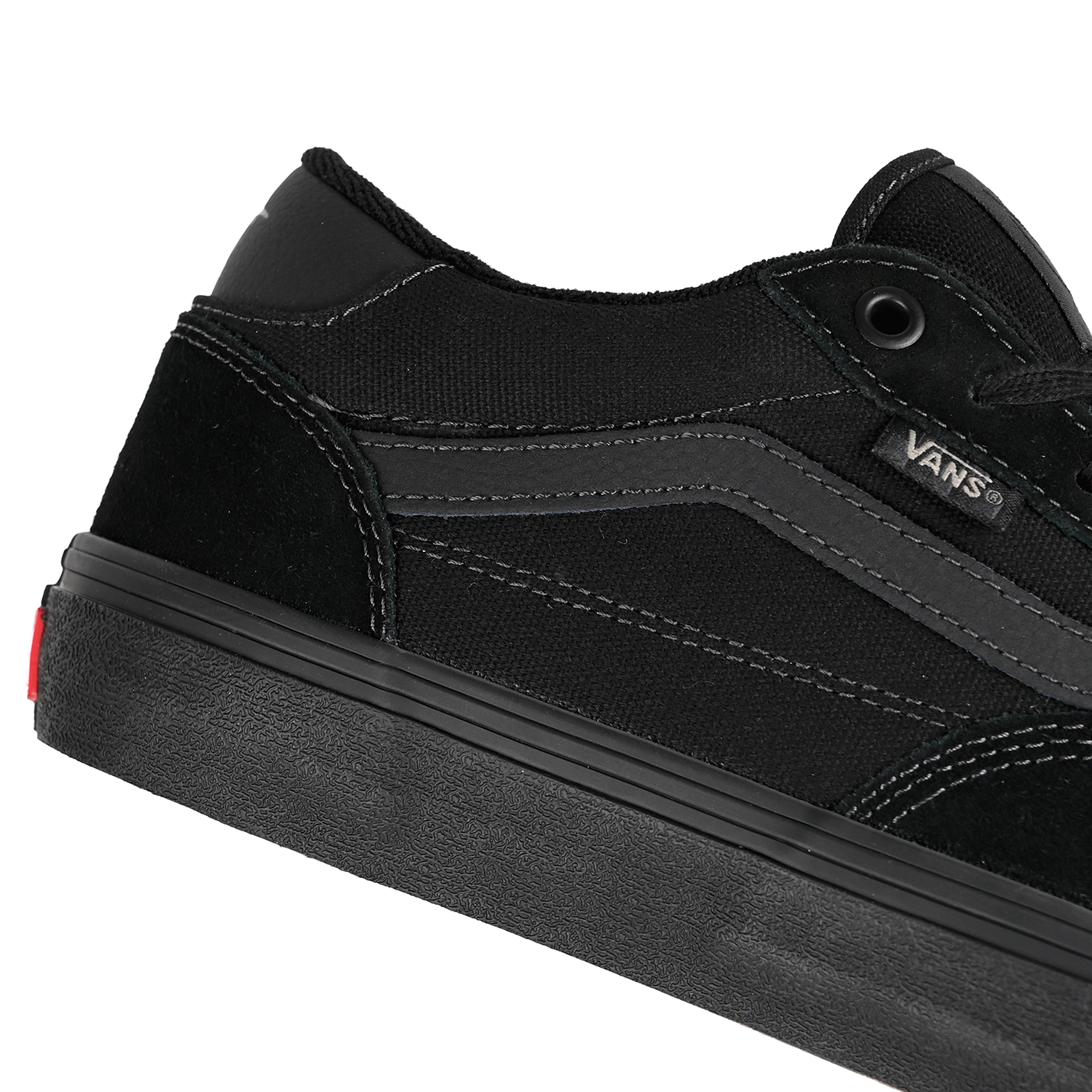 Close up of Vans Rowan sneaker in black with black sole on a white background