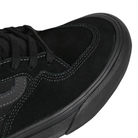 Close up of Vans Rowan sneaker in black with black sole on a white background