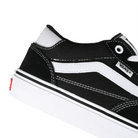 Detail of Black and true white Vans Skateboarding Skate Rowan Zorilla pro model skateboard sneaker on a white background