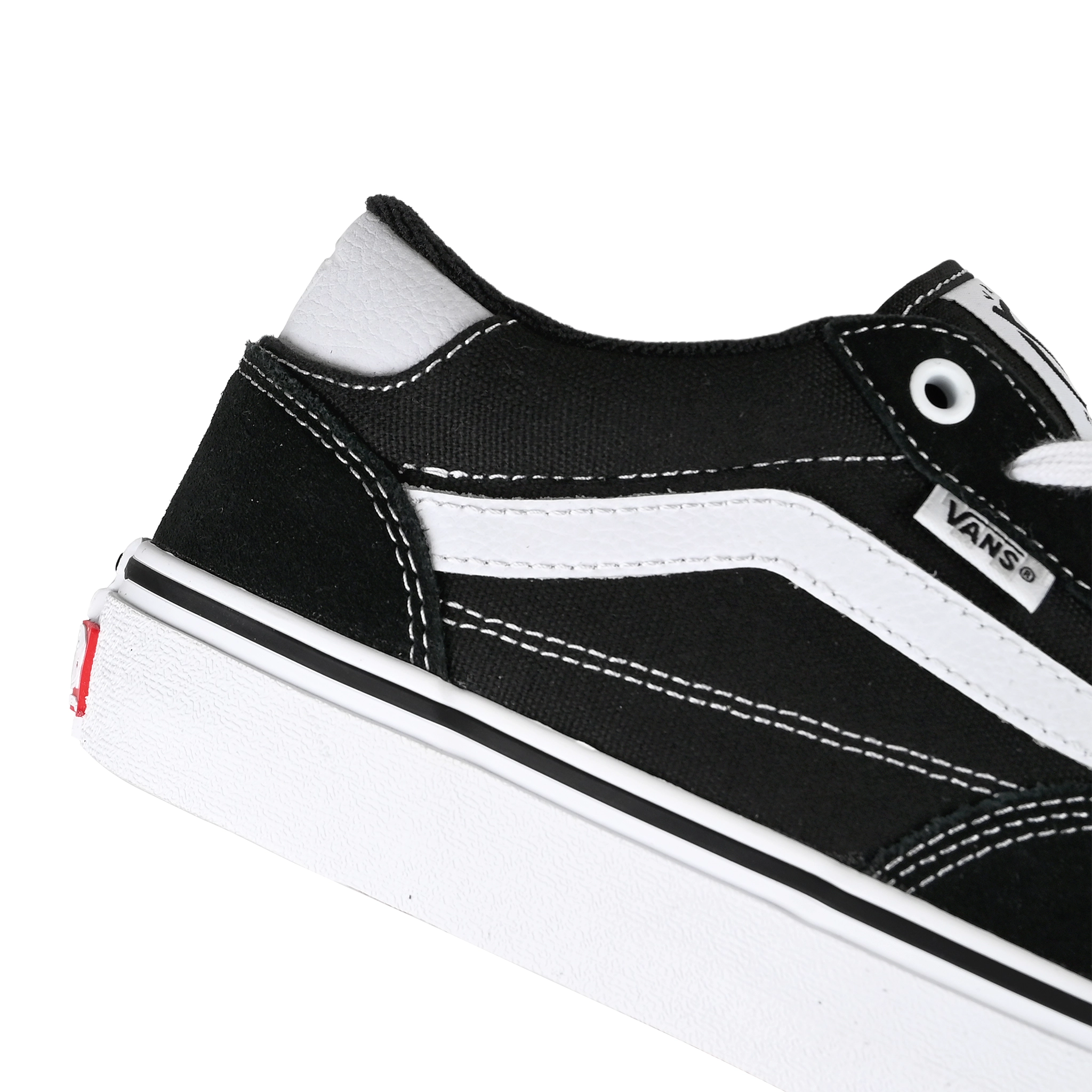 Detail of Black and true white Vans Skateboarding Skate Rowan Zorilla pro model skateboard sneaker on a white background