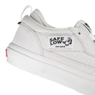 Close up of white Vans Skateboarding Skate Safe Low Men's skateboard sneakers on white background